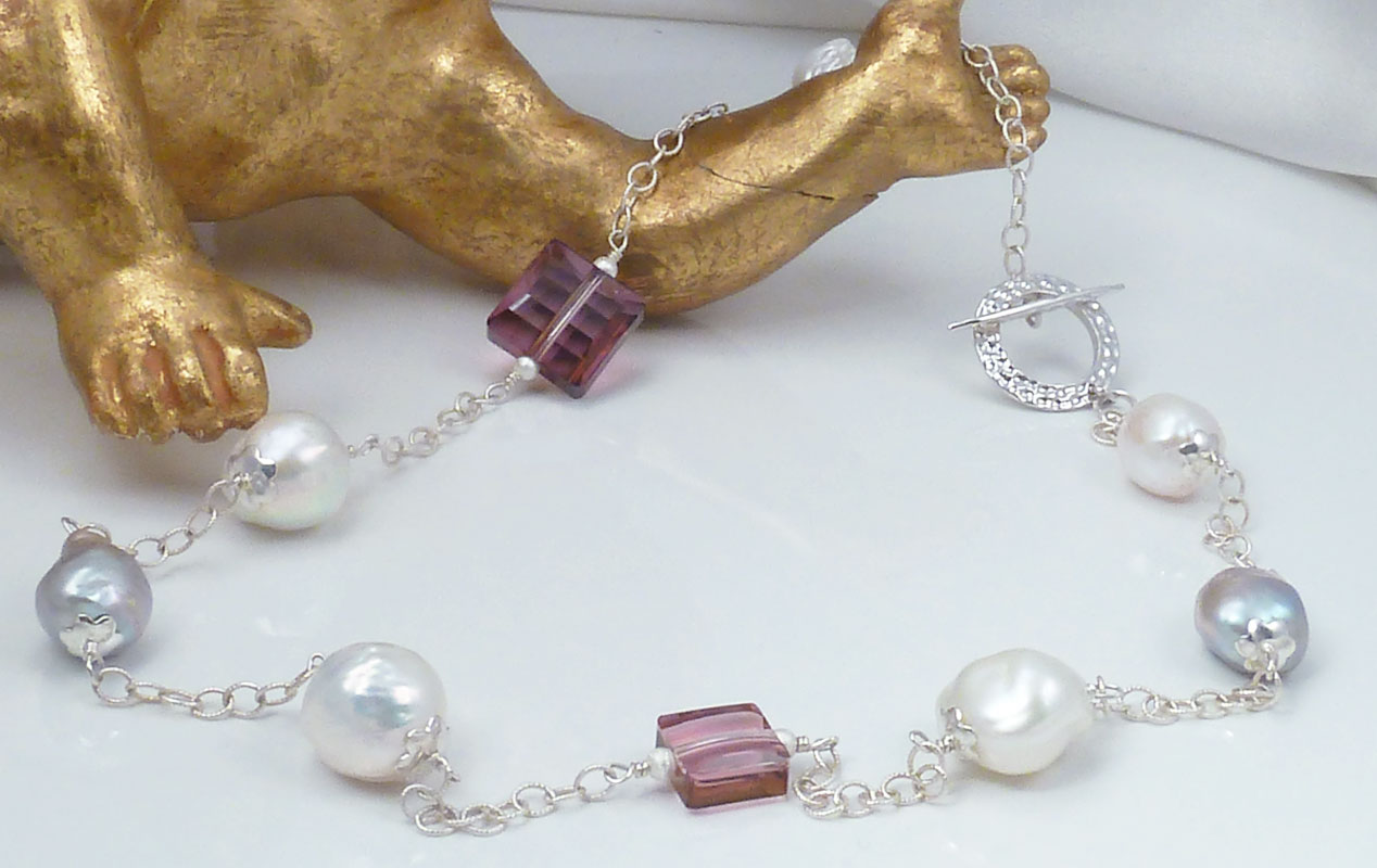 Designer pearl jewelry created by Jewelry Olga