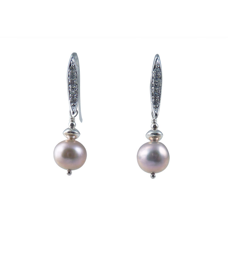 Dangling pink pearl earrings . Designer pearl jewelry for stylish women
