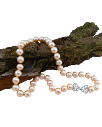 Apricot pink pearl necklace features high quality freshwater pink pearls . Designed and created by Jewelry Olga Montreal Canada