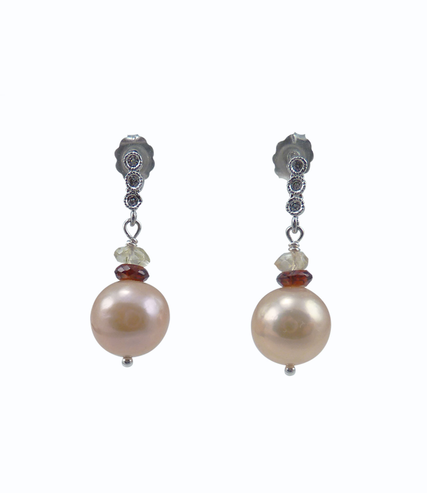 Designer pearl earrings peach golden pearls. Modern pearl jewelry