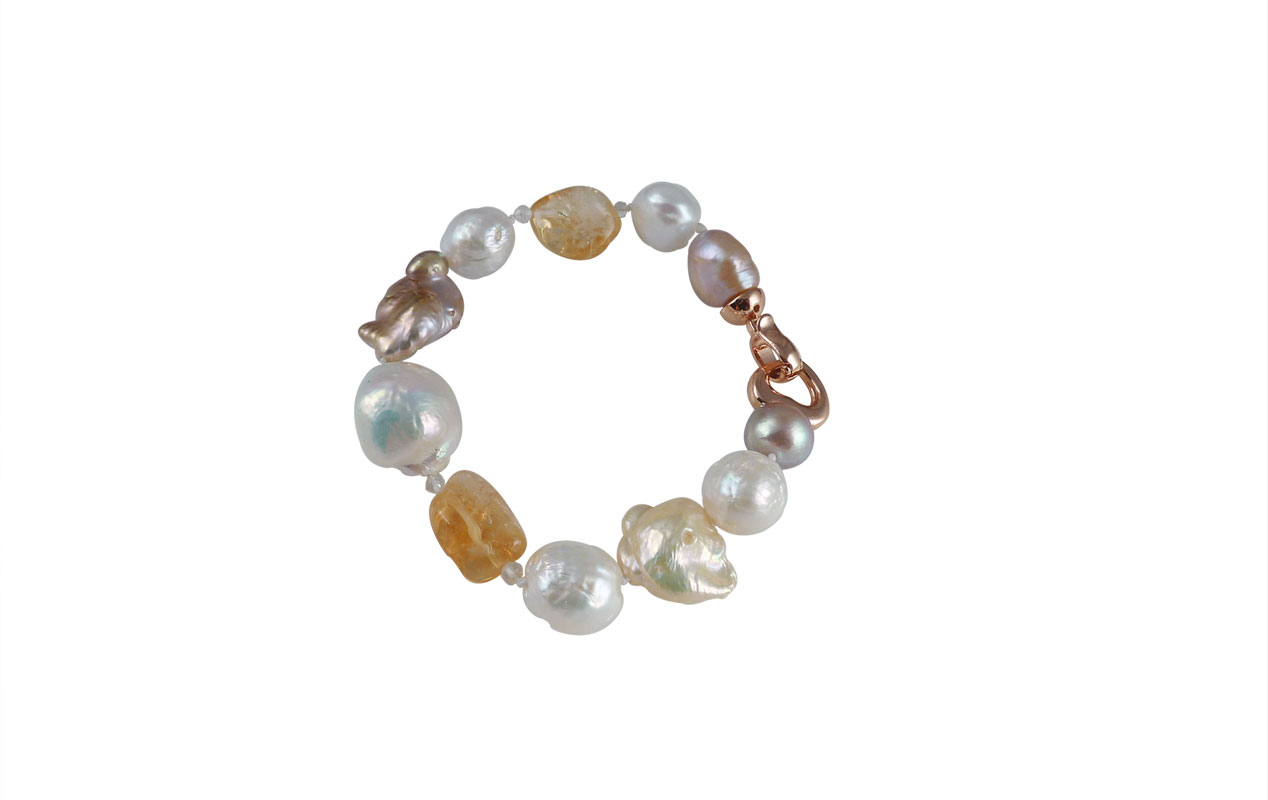 Pantone colors 2021are Ultimate Gray and Illuminating Yellow. For unique pearl bracelet, we add yellow citrine. Designer pearl jewelry created by Jewelry Olga in Montreal Canada
