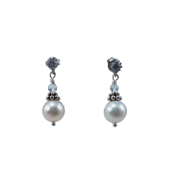 Silvery white pearl earrings. Modern pearl jewelry feature real pearls