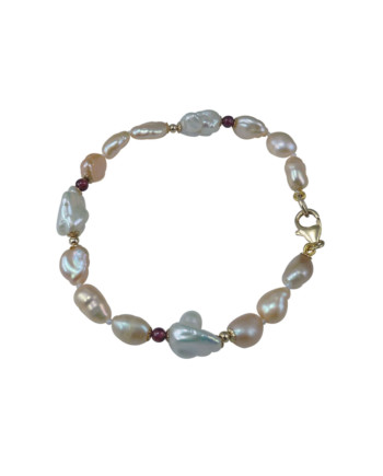Pearl bracelet keshi garnet as colored accent. Modern pearl jewelry designed and created by Jewelry Olga Montreal Canada