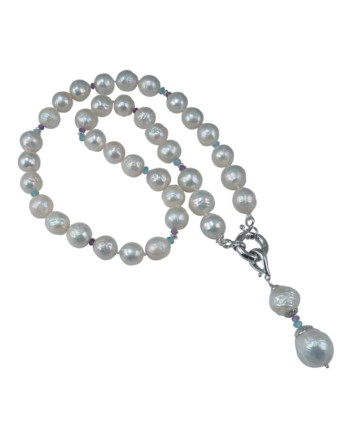 Stylish white pearl necklace features white freshwater pearls. Designed and created by Jewelry Olga Montreal Canada