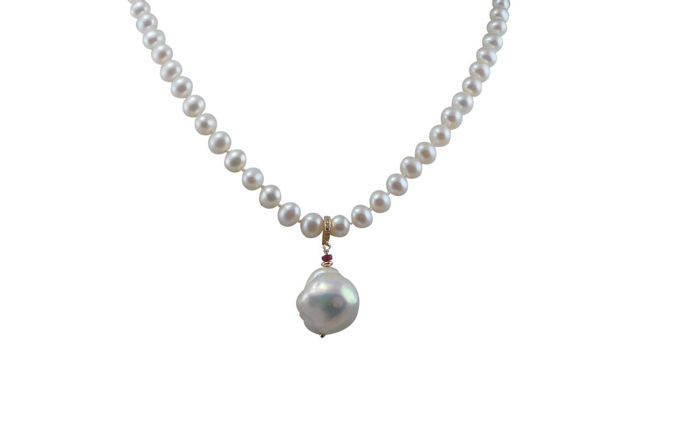 Classic white pearl necklace with a detachable pearl pendant. Designed and created by Jewelry Olga Montreal Canada